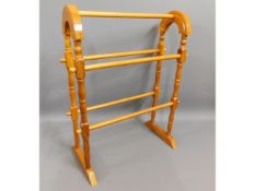 A modern pine towel rail, 29in high x 21.25in wide