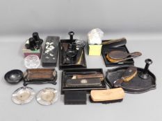 A quantity of mostly ebonised dressing table items