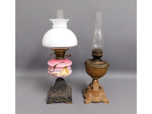 Two antique oil lamps, tallest 23.5in