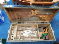 A carpenters tool chest with contents