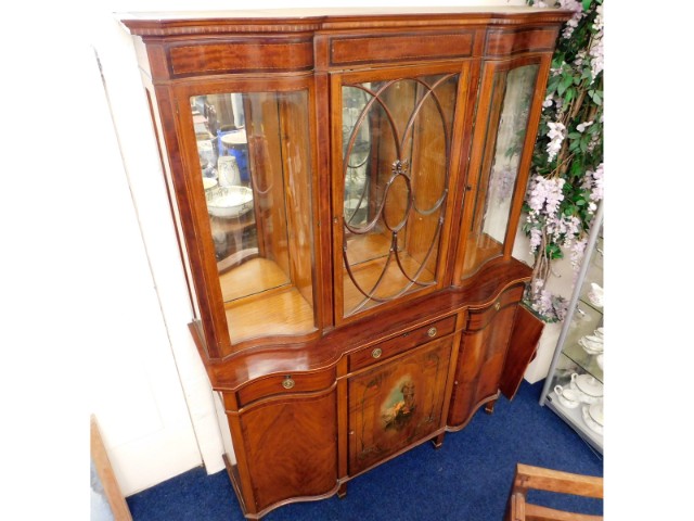 A c.1900 serpentine fronted mahogany display dress