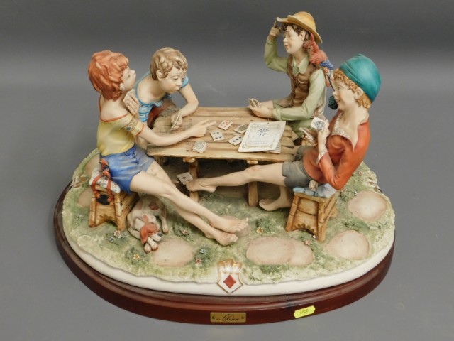 A large Capodimonte mounted figure group "The Chea