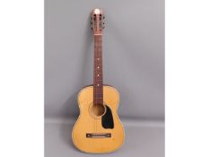 A Selmer acoustic guitar