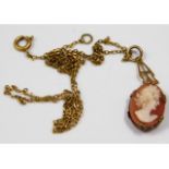 A 9ct gold chain with cameo, chain tangled, 2g