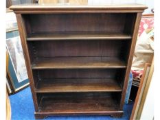 A low level floor standing mahogany bookcase, 42in