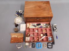 A vintage work box with contents