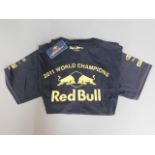 A Red Bull F1 2011 world championship tee shirt wi