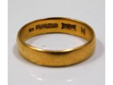 A 22ct gold band, size P/Q, 4.6g