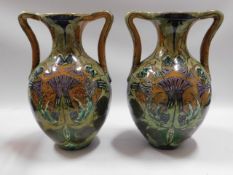 A pair of art nouveau Dutch De Distel faience vase