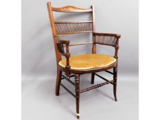 An inlaid Arts & Crafts style walnut armchair, som