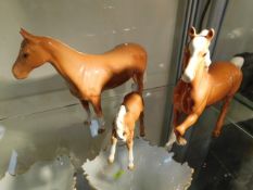 A Beswick family of Palomino horses