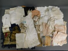 A quantity of linen & other textiles