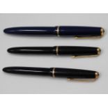 A Parker Duofold fountain pen twinned with two Par