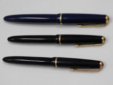 A Parker Duofold fountain pen twinned with two Par