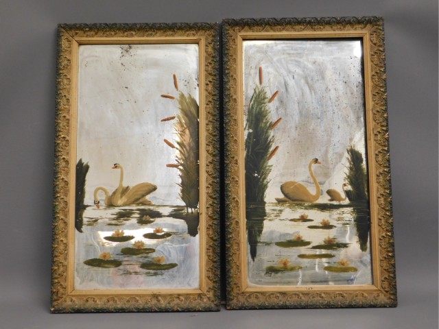 A pair of framed Victorian painted mirrors, 27,.5i