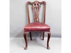 A Chippendale style leather upholstered mahogany c