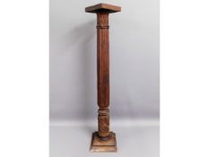A mahogany torchere, 43in high