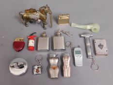 A selection of novelty lighters & an green onyx pi