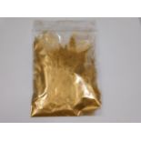 A bag containing 30g of "24ct gold dust" used by dentists to help secure porcelain crowns, dust bein