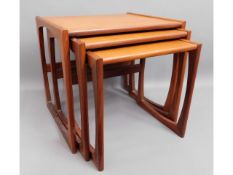 A retro G-Plan nest of teak tables, largest 21.25i