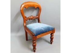 A Victorian mahogany balloon back child's chair wi