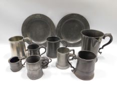 A Victorian pewter quart, two 19thC. pewter plates