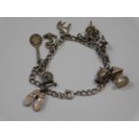 A small silver charm bracelet, 24.2g