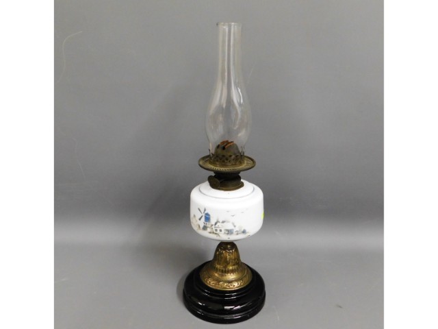 An oil lamp with hand decorated windmill scene, 22