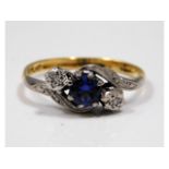 An 18ct gold sapphire ring with platinum mounted i