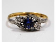 An 18ct gold sapphire ring with platinum mounted i