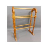 A modern pine towel rail, 29in high x 21.25in wide