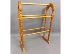 A modern pine towel rail, 29in high x 21.25in wide