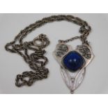 A silver chain with art nouveau styled lapis lazul