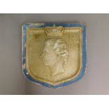 A moulded plaque of Queen Elizabeth II, 19in x 18.