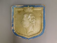 A moulded plaque of Queen Elizabeth II, 19in x 18.