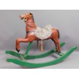 A vintage child's rocking horse, 45in wide x 32in