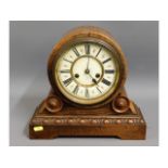 An antique oak drum head clock, fault to hand, 12i
