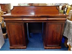 A 19thC. mahogany chiffonier with two pedestal cup