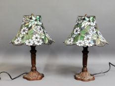 A pair of Tiffany style lamps with coloured glass