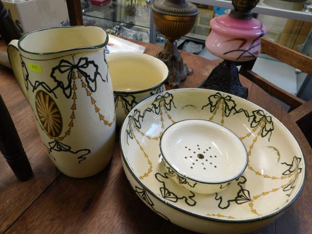 A Royal Doulton wash basin & jug set