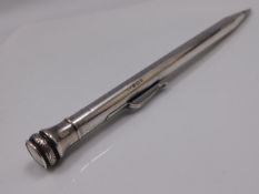 A silver pencil by Elkington & Co.