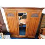 A stained satinwood compactum with mirror, 81.75in