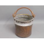 A copper fireside bucket, 10in high