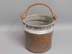 A copper fireside bucket, 10in high