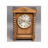 An antique oak cased mantle clock, 13.75in high x