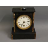 A Victorian slate clock with marble inlay, dial cr