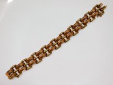 A rose & yellow gold 14ct bracelet, 31.6g, 8in lon