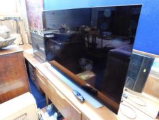 A modern LG Oled television set, 55in screen