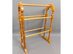 A modern pine towel rail, 29in high x 21.25in wide