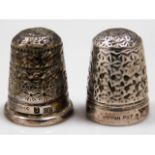 A Charles Horner silver thimble & one white metal,